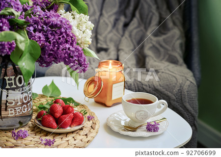 Bouquet of purple Lilac flowers and strawberry Bouquet of purple Lilac flowers and strawberry 92706699