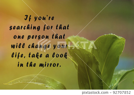 Motivational quote with fresh green nature and blurred leaf background. Motivational quote with fresh green nature and blurred leaf background. 92707852