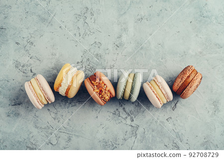 Colorful macarons on blue Colorful macarons on blue 92708729