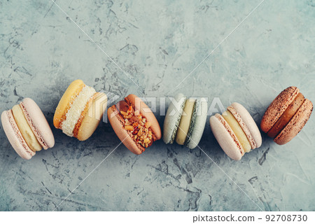 Colorful macarons on blue 92708730