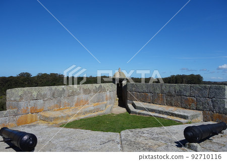 Old cannons, tower and massive wall from Fort santa tereza, Uruguay Old cannons, tower and massive wall from Fort santa tereza, Uruguay 92710116