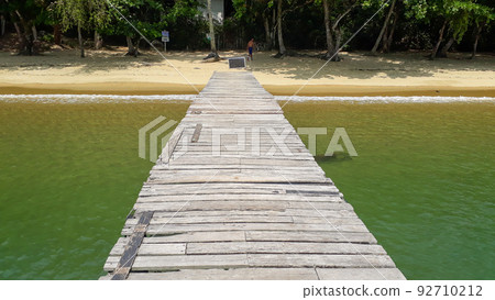 Clear and green waters on tropical beach at Ilha Grande, Rio de Janeiro, Brazil Clear and green waters on tropical beach at Ilha Grande, Rio de Janeiro, Brazil 92710212
