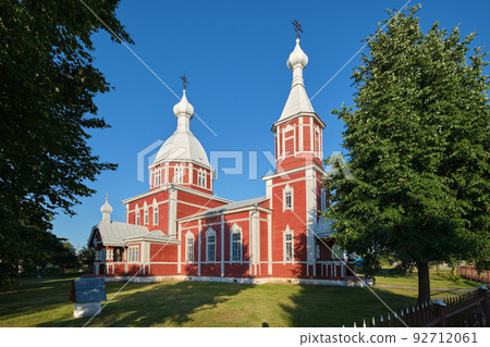 Old ancient orthodox wooden church of the Holy Apostles Peter and Paul, Ostrov, Brest region, Lyakhovichi district, Belarus. 92712061