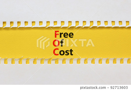 FOC free of cost symbol. Concept words FOC free of cost on yellow paper on a beautiful white background. Business and FOC free of cost concept. Copy space. 92713603