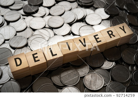 Image of delivery / delivery | Block and coin written as "DELIVERY" 92714259