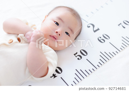 3 months old baby infant height measurement height gauge growth copy space 3 months old baby infant height measurement height gauge growth copy space 92714681