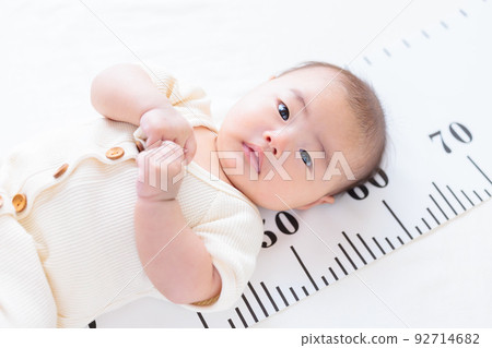 3 months old baby infant height measurement height gauge growth copy space 3 months old baby infant height measurement height gauge growth copy space 92714682