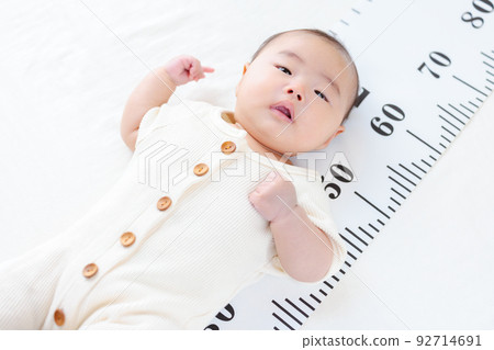 3 months old baby infant height measurement height gauge growth copy space 3 months old baby infant height measurement height gauge growth copy space 92714691