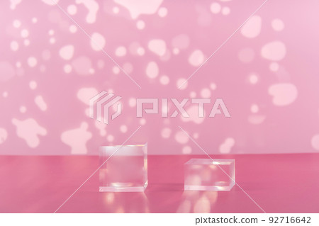 Acrylic blocks on pink background, pedestal cosmetic display glass podium platform for product presentation, geometric stand for cosmetics, mockup scene for jewellery 92716642