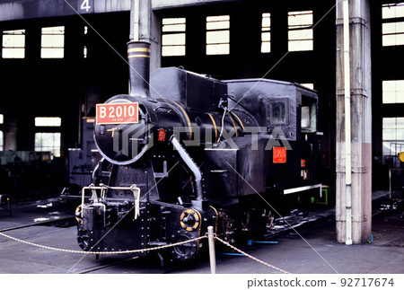 2004 B2010 steam locomotive standing in the locomotive warehouse 92717674