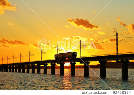 Ibaraki Prefecture, Kitaura Bridge and train at dusk 92718554