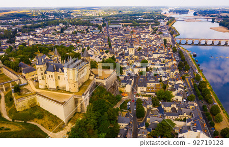 Fly over picturesque town of Saumur and medieval castle Saumur. France 92719128