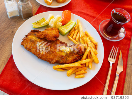 Roasted fish fillet with fried potato Roasted fish fillet with fried potato 92719293