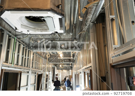 Interior work: Corridor with bare basement Interior work: Corridor with bare basement 92719708