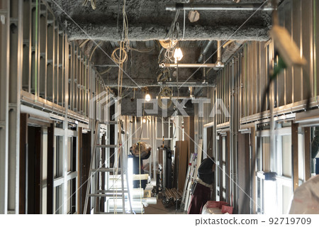 Interior work: Corridor with bare basement Interior work: Corridor with bare basement 92719709