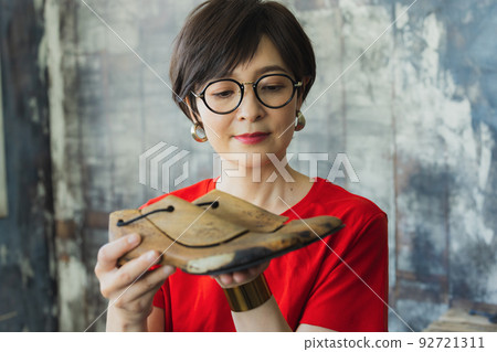 woman in red t-shirt woman in red t-shirt 92721311