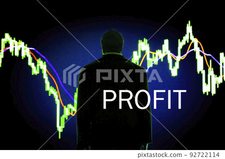 PROFIT word with the background of a businessman looking at the uptrending blue graph 92722114