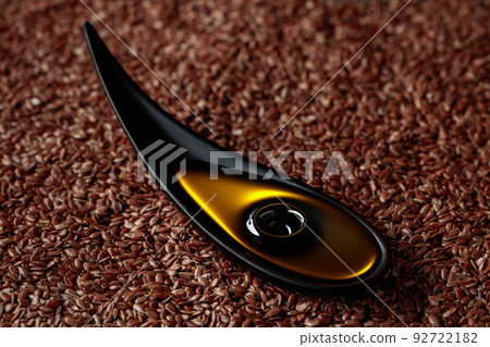 Fflaxseed oil in small black bowl. 92722182