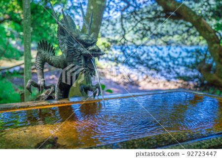 The water basin at Hakone Kuzuryu Shrine (main shrine) on the shores of Lake Ashinoko 92723447