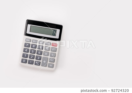 White digital calculator on the top view isolated on white background. Directly Above Shot Of Calculator On white Background White digital calculator on the top view isolated on white background. Directly Above Shot Of Calculator On white Background 92724320