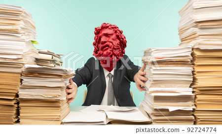 Abstract modern collage. The man with the plaster head of David working in the office and piles of paperwork, he is overloaded with work. Breaks a paper contract and quits his job Abstract modern collage. The man with the plaster head of David working in the office and piles of paperwork, he is overloaded with work. Breaks a paper contract and quits his job 92724774