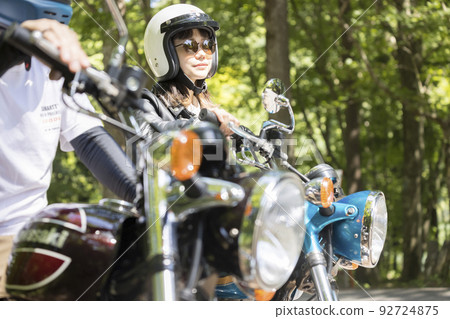 Touring image couple bike girls Touring image couple bike girls 92724875