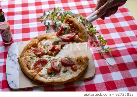 Homemade margherita pizza serving 92725852