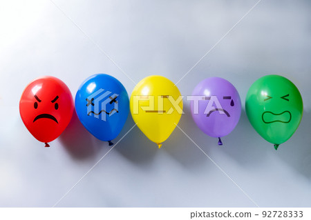 Mental health concept - selection of emojis on colorful balloons for different mental states Mental health concept - selection of emojis on colorful balloons for different mental states 92728333