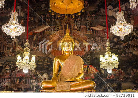 Statue of sitting Buddha in ornate temple Statue of sitting Buddha in ornate temple 92729011