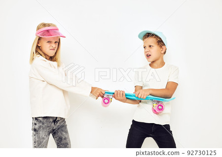 Little couple kids boy girl posing games fun lifestyle childhood Little couple kids boy girl posing games fun lifestyle childhood 92730125