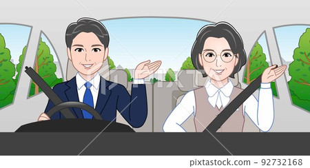 A man and a woman riding in a car A man and a woman riding in a car 92732168