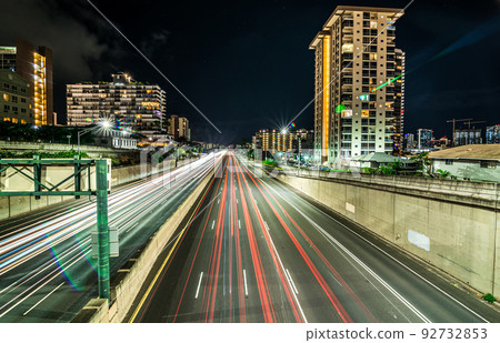 evening commute on H1 Freeway at night in honolulu hawaii 92732853