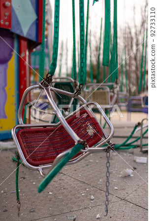 Carousel for children during war in Ukraine shot by Russian soldiers 92733110