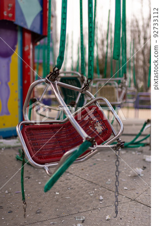 Carousel for children during war in Ukraine shot by Russian soldiers 92733112