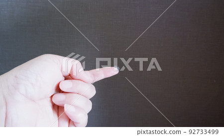 hard contact lens on finger 92733499