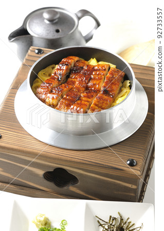 Kamameshi with kabayaki eel and dashi chazuke set, photographed against a white background 92733557