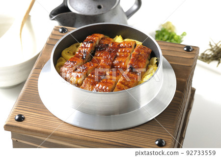 Kamameshi with kabayaki eel and dashi chazuke set, photographed against a white background 92733559