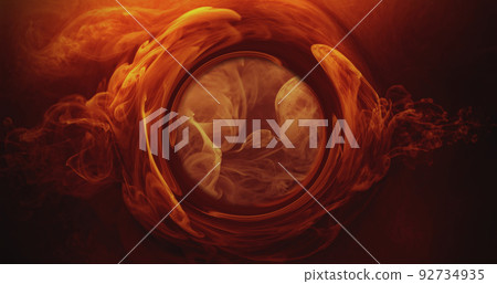 Color water twirl. Fume circle. Ink wave. Astrology eye. Esoteric vision. Orange red golden steam circle vortex on dark creative abstract background. Color water twirl. Fume circle. Ink wave. Astrology eye. Esoteric vision. Orange red golden steam circle vortex on dark creative abstract background. 92734935