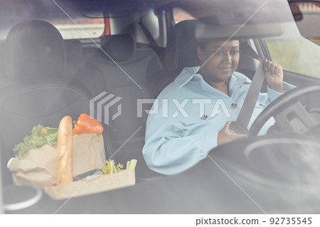 Young Black Woman Driving 92735545
