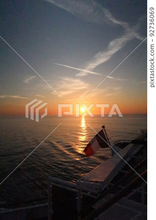 Sunset seen from a ferry on the English Channel 92736069