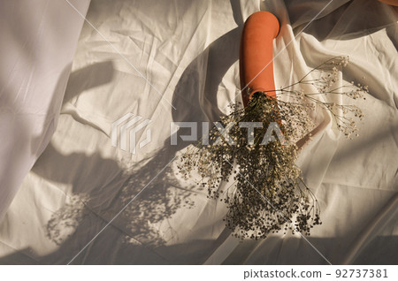 Earthenware vases and objects, pastel terracotta colors, with still life like vegetation 92737381