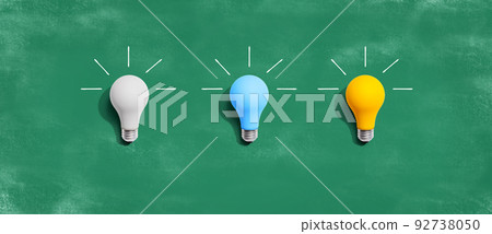 Idea and creativity concept with white, blue and yellow light bulbs Idea and creativity concept with white, blue and yellow light bulbs 92738050