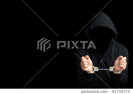 person in handcuffs person in handcuffs 92738725