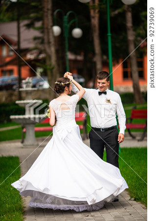 Happy bride and groom after wedding ceremony Happy bride and groom after wedding ceremony 92739069