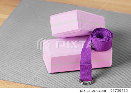 Yoga blocks, exercise mat and yoga belt for training. Yoga equipment. 92739413