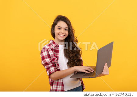 typing school blog on computer. kid on video lesson. teen girl use laptop for blogging. typing school blog on computer. kid on video lesson. teen girl use laptop for blogging. 92740133