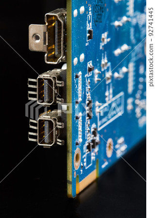HDMI, DP connectors on the Computer graphics card on black background 92741445