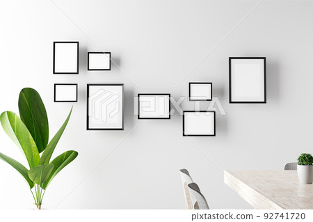 Portrait frame mockup with palm on white wall. 3d render Portrait frame mockup with palm on white wall. 3d render 92741720