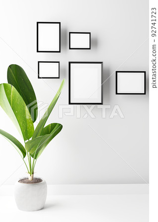 Portrait frame mockup with palm on white wall. 3d render 92741723