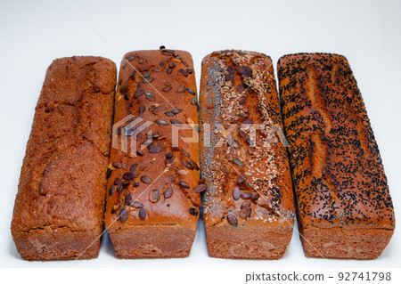 Dietary whole grain bread. Fresh bread is cooled. Dietary whole grain bread. Fresh bread is cooled. 92741798